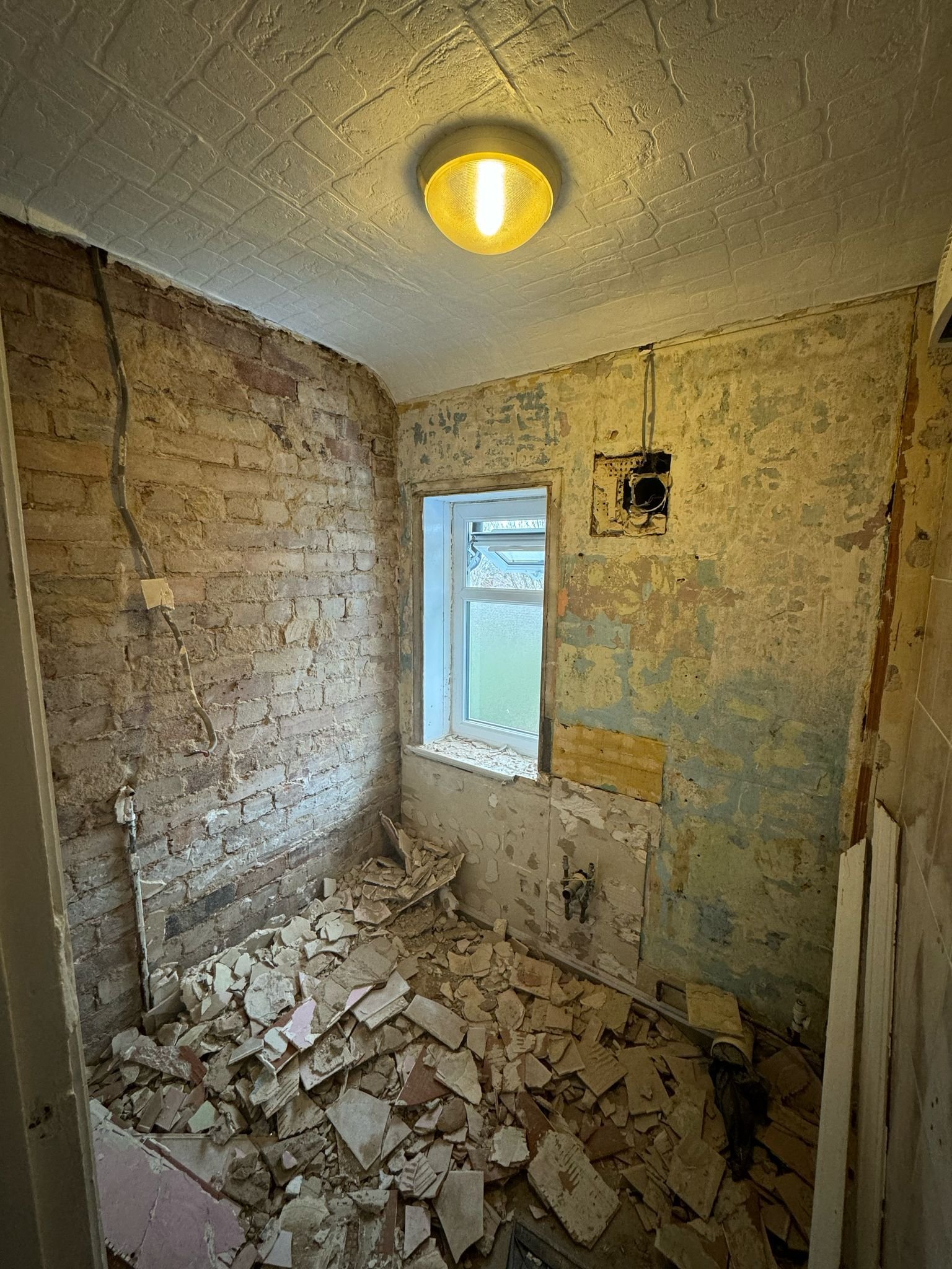 Modern bathroom installation with coordinated wall and floor finishes