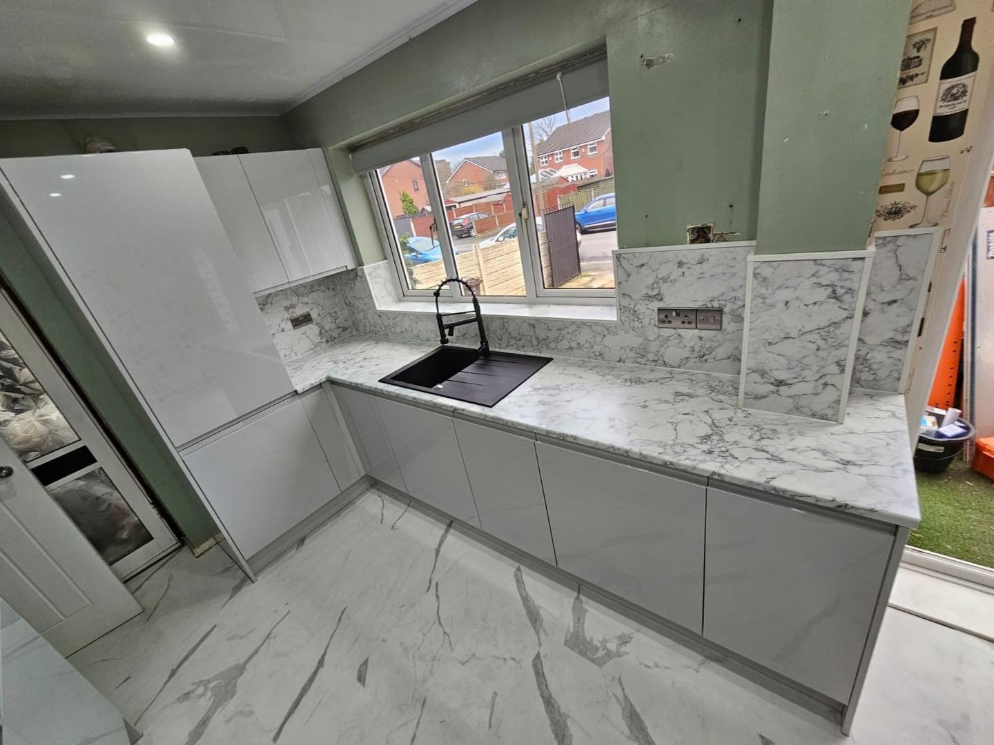 Bright fitted kitchen by Luxury UPVC bathroom and kitchen renovation specialists