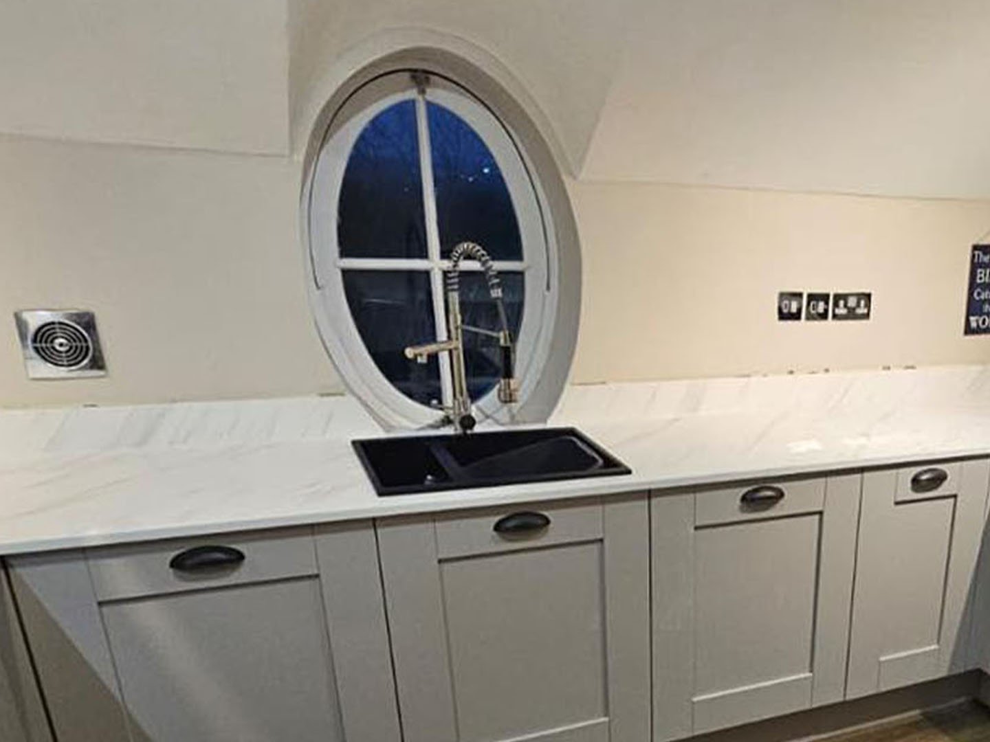 Dark finish kitchen by Luxury UPVC bathroom and kitchen renovation specialists