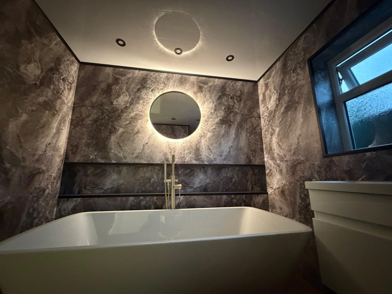 Modern UPVC bathroom wall panel installation